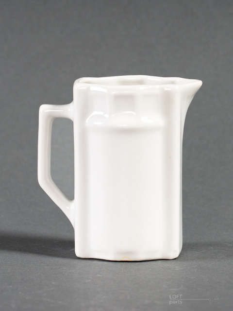 Old porcelain milk jug