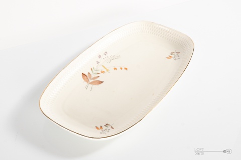 patera z kwiatowym motywem chodzież